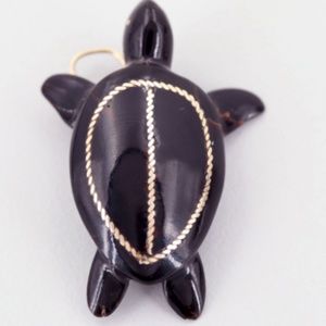NOT FOR SALE!!!  Looking for this Turtle Pendant!
